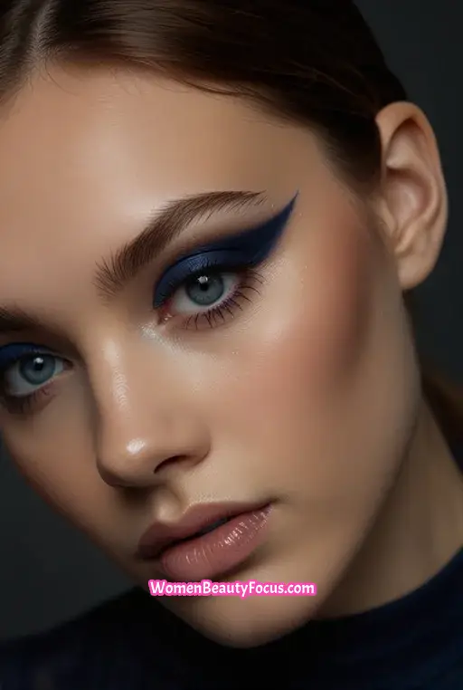 10. Deep Navy Eyeshadow with Glossy Lids