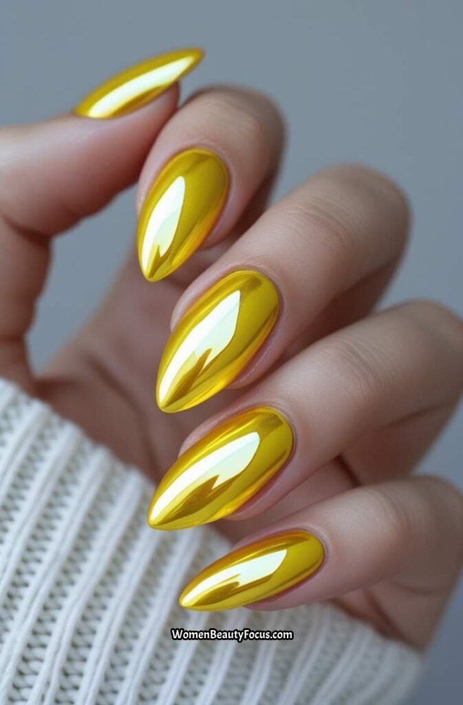 1. Chrome Yellow Almond Nails with Glossy Finish