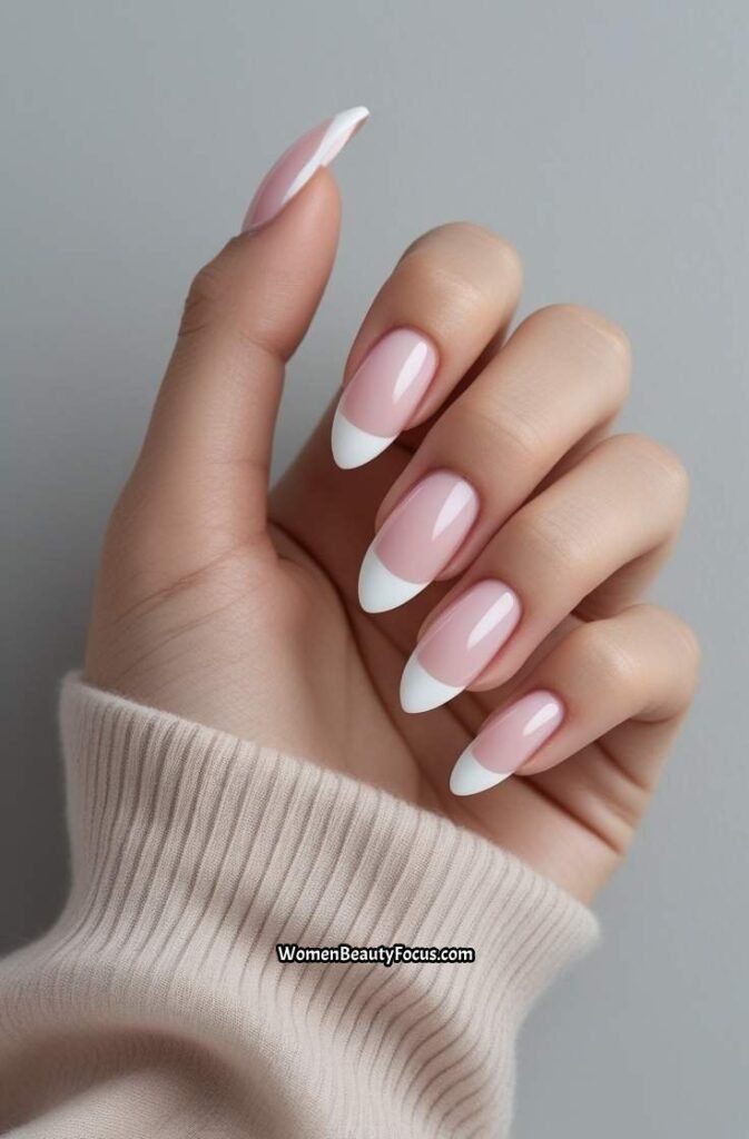 1. Soft Almond French Tips with Sheer BaseA