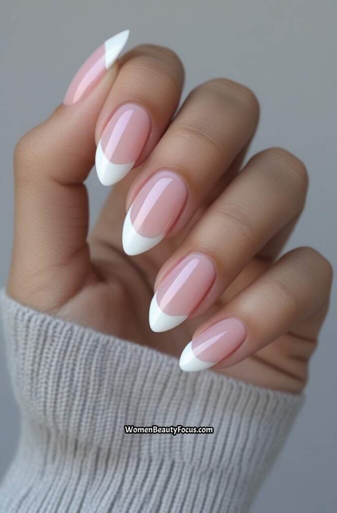 1. Soft Pink Almond Nails with White Tips