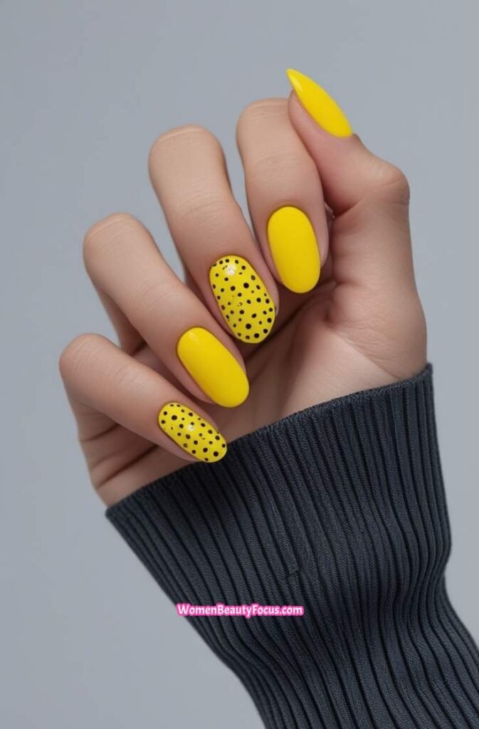10. Bright Yellow Nails with Black Dots