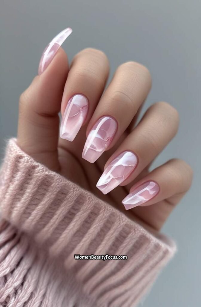 10. Soft Rose Quartz Marbled Nails