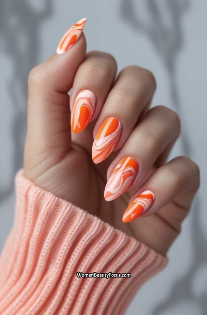 11. Bright Orange and Coral Marble Nails