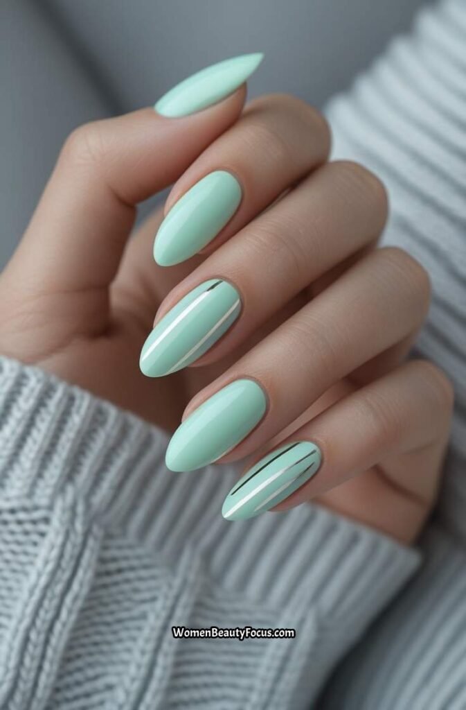11. Mint Pastel Nails with Fine Silver Lines