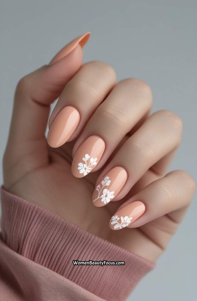 11. Peach Floral Accent Nails