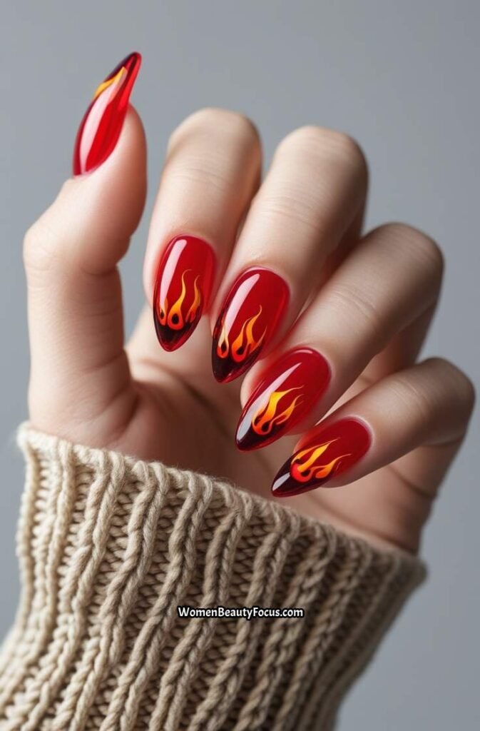 11. Red Glass Nails with Flame Tips