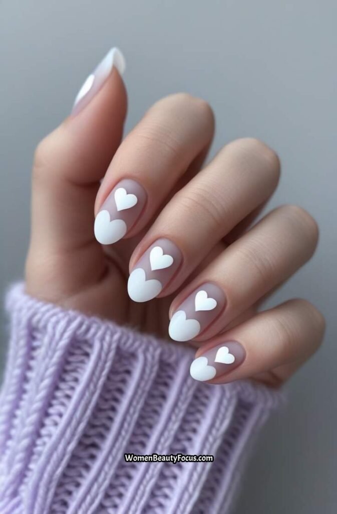 11. White Heart Accent Nails