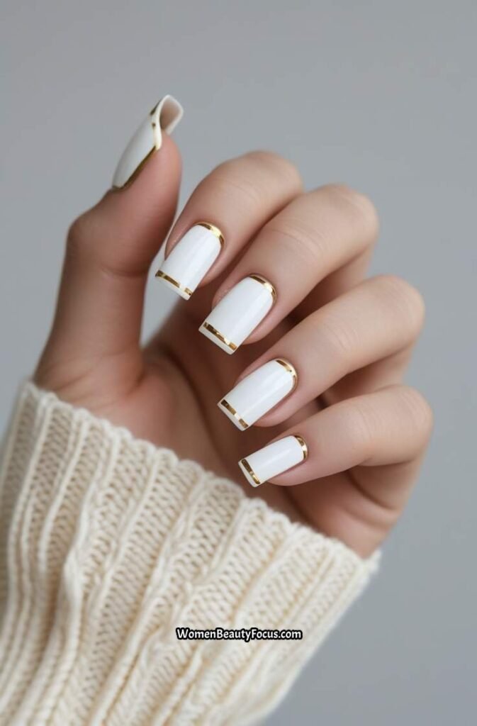 11. White and Gold French Tip Nails