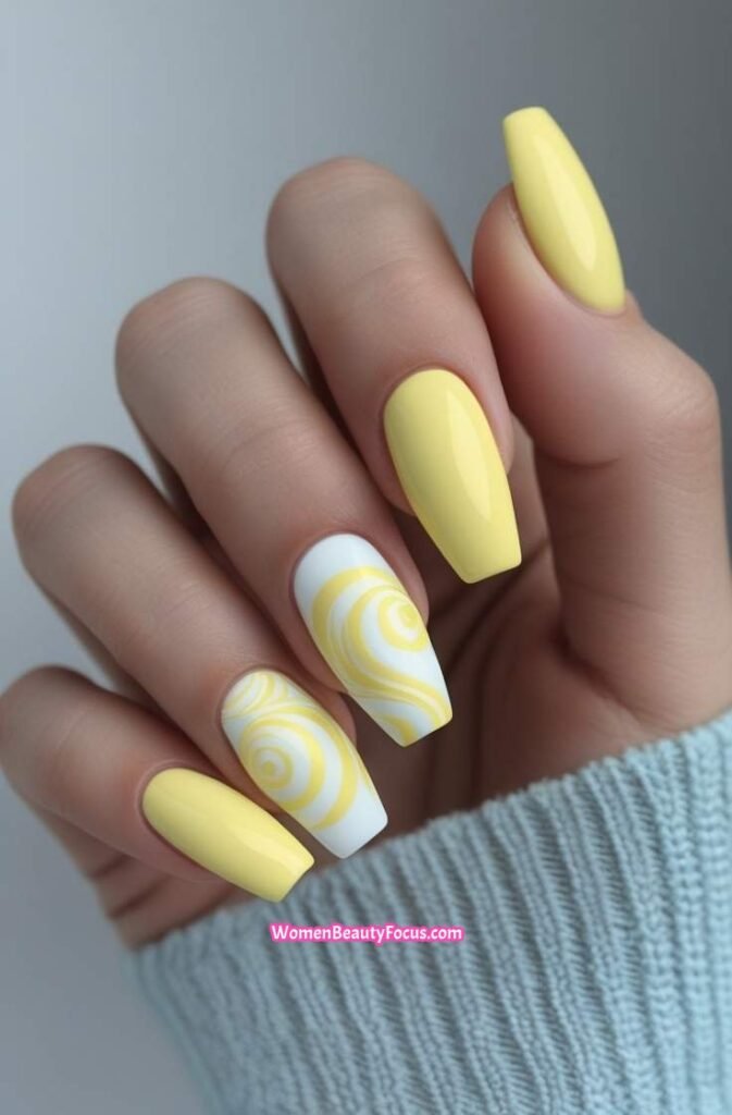 11. Yellow and White Swirl Nails