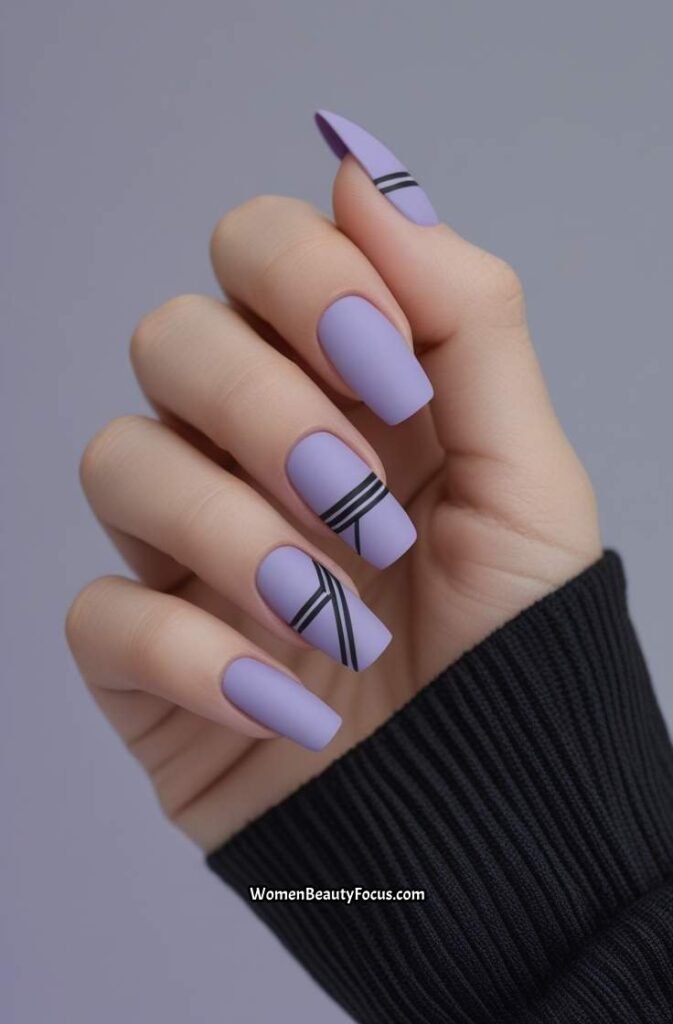 12. Lavender Matte Nails with Black Accents
