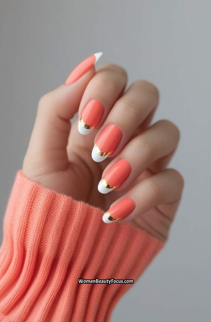 2. Coral French Tip Nails with Gold Foil