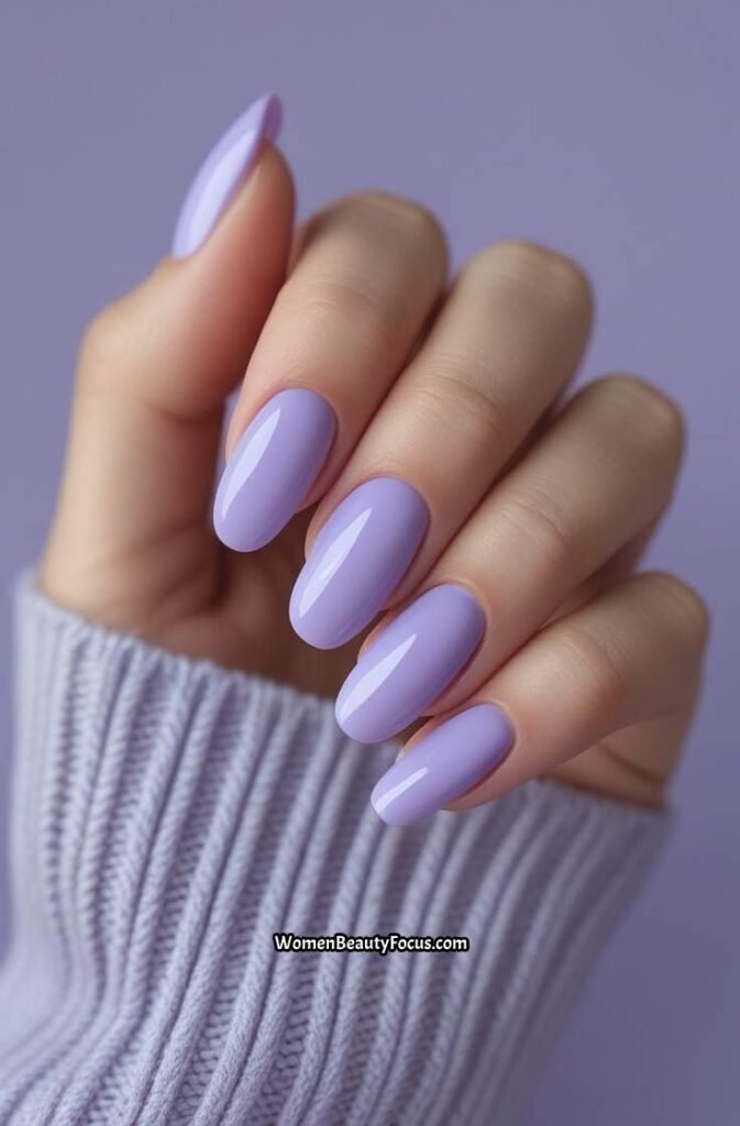 2. Glossy Lilac Short Acrylic Nails