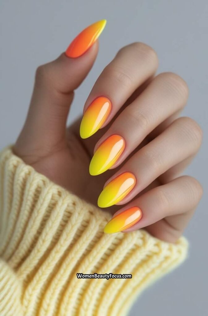 2. Neon Orange and Yellow Ombre Tips