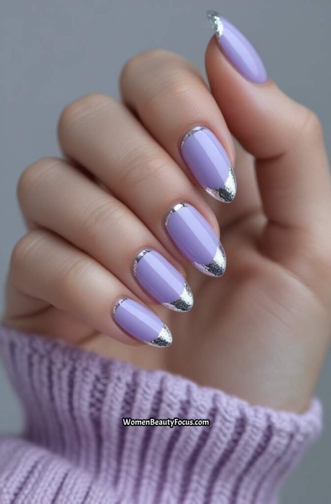 2. Pale Lavender Almond Nails with Silver Accents