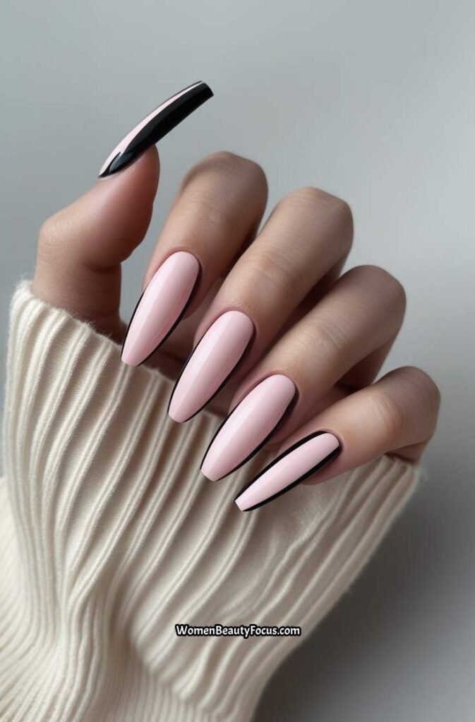 2. Pink French Tips with Black Accents