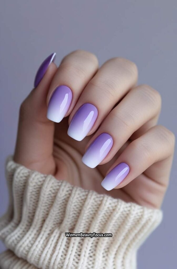 2. Soft Purple Ombre Nails with White Tips