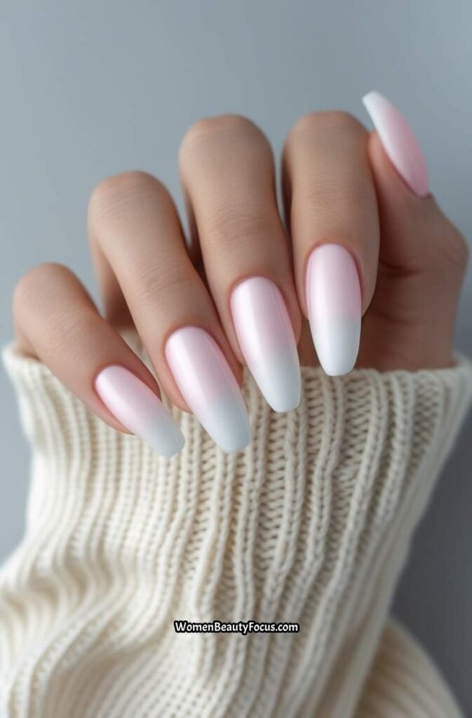 2. Soft White Ombre Nails