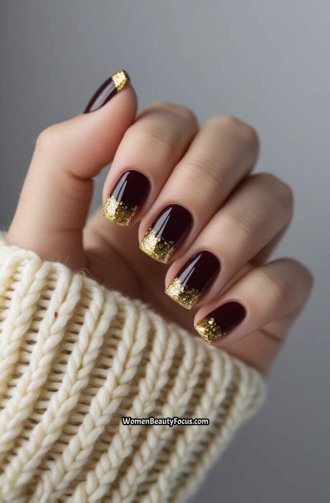 3. Cherry Brown Nails with Gold Glitter Tips