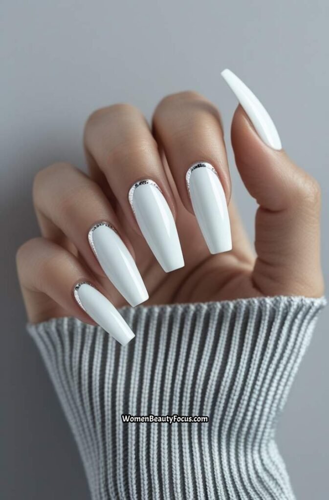 3. Elegant White French Tips with Silver Detailing