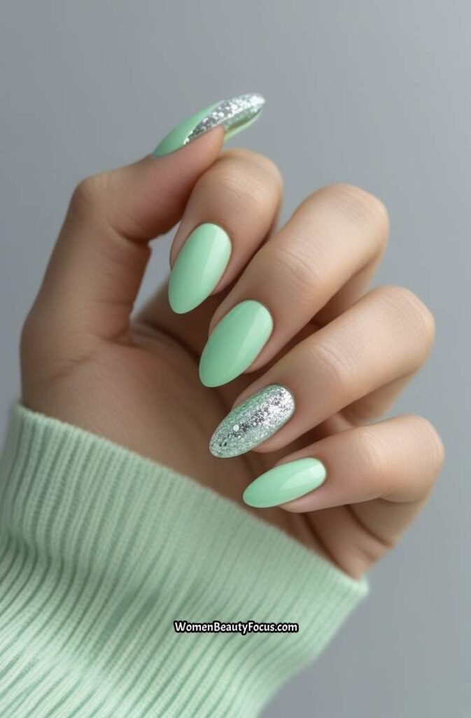 3. Mint Green Acrylic Nails with Silver Glitter
