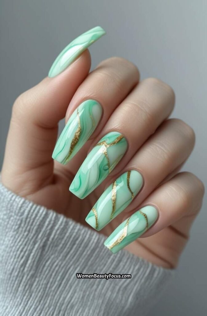 3. Mint Green Marble Nails