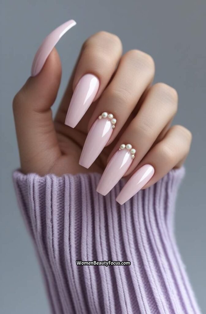 3. Pale Pink Coffin Nails with Pearl Detail