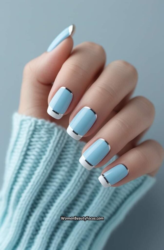 4. Baby Blue French Tip Nails with Silver Lining