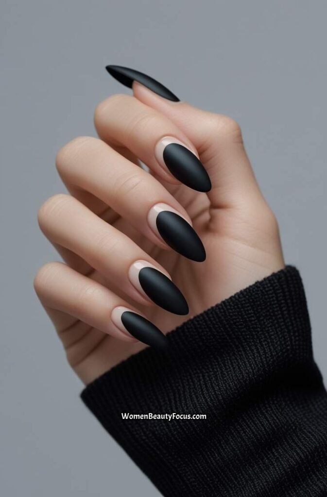 4. Bold Black French Tips with a Matte Finish