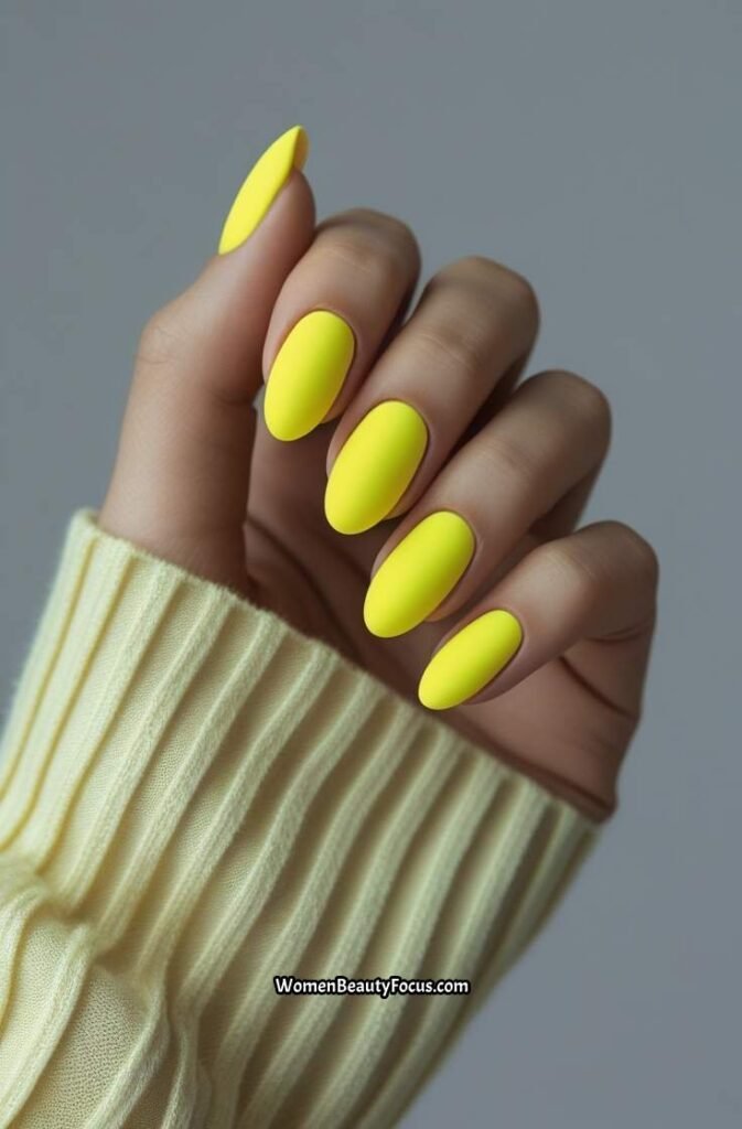 4. Bright Neon Yellow Nails with a Matte Finish