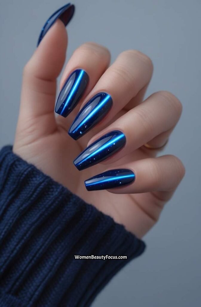 4. Cosmic Blue Cat Eye Nails