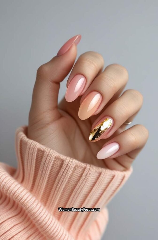 4. Glossy Peach Ombre Nails with Gold Foil