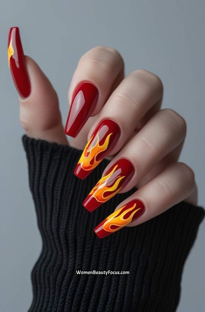 4. Glossy Red Coffin Nails with Flame Accents