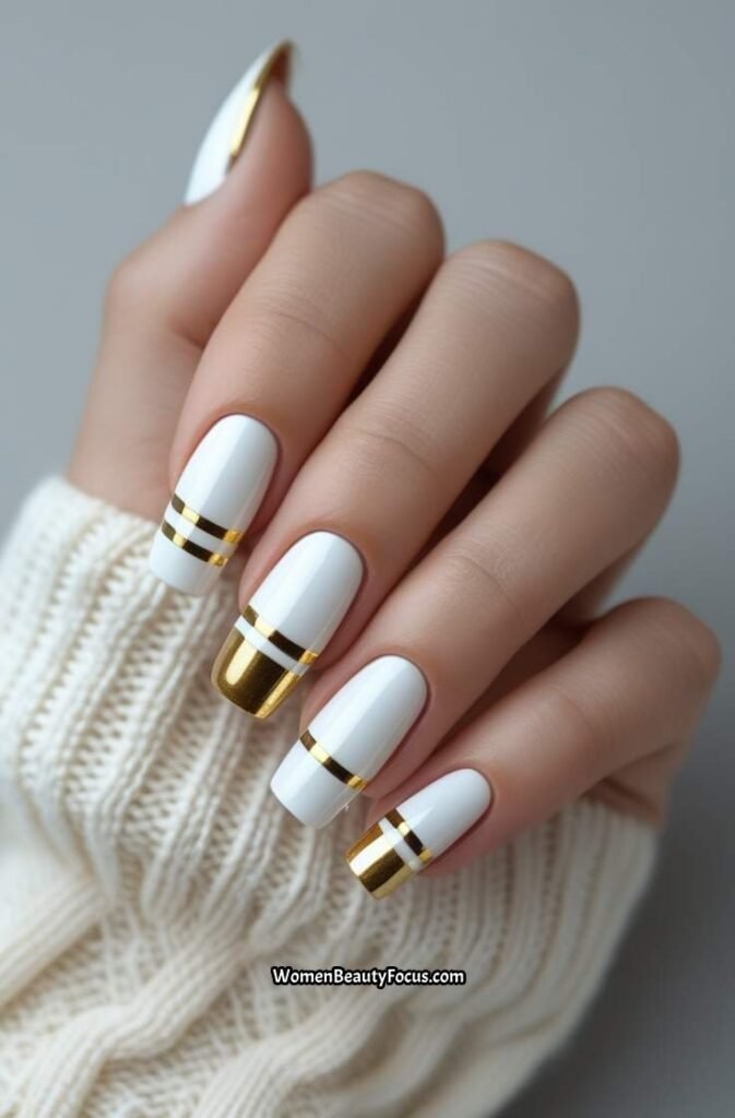 4. White and Gold Accent Nails