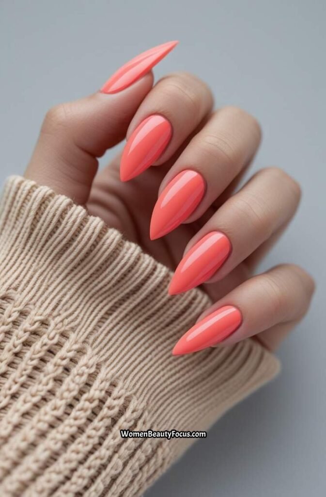 5. Coral Pink Short Stiletto Nails