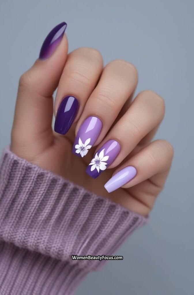 5. Gradient Purple Nails with Floral Design