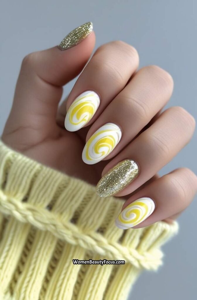 5. Lemonade Swirl Nails with Glitter Accent