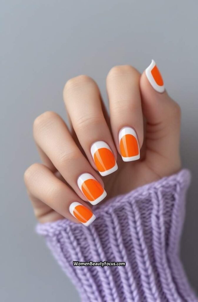 5. Orange French Tips with a Twist