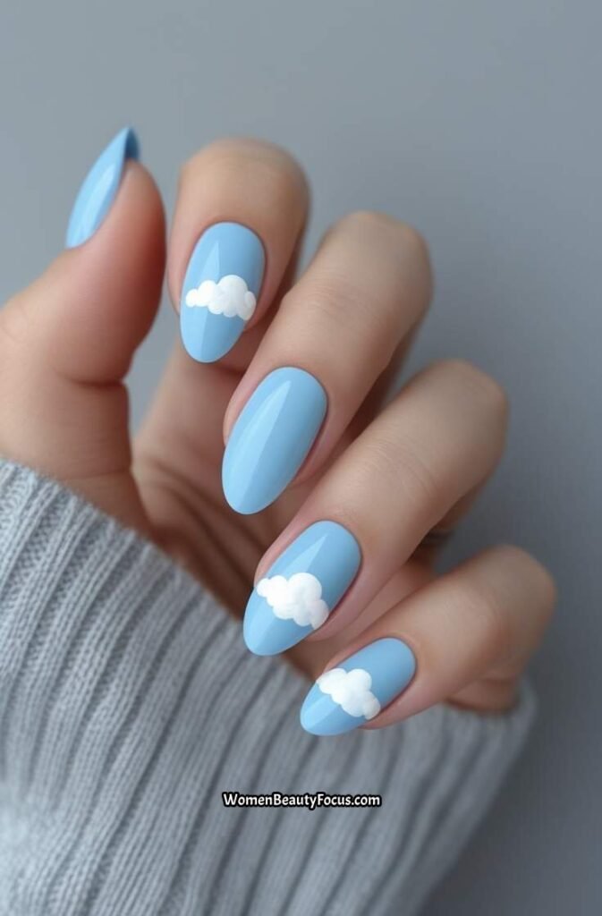 5. Sky Blue Acrylic Nails with Cloud Art