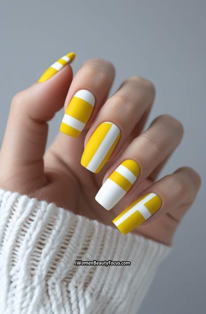 5. Yellow and White Geometric Nail Art