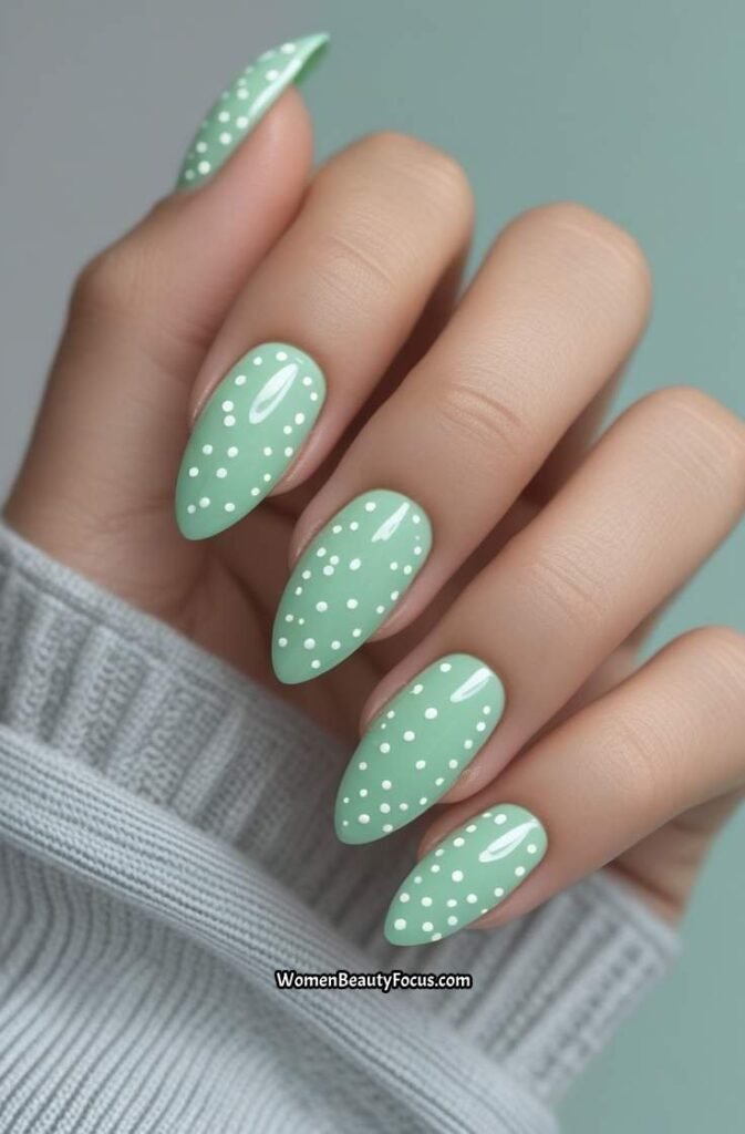 6. Mint Green Almond Nails with White Dots