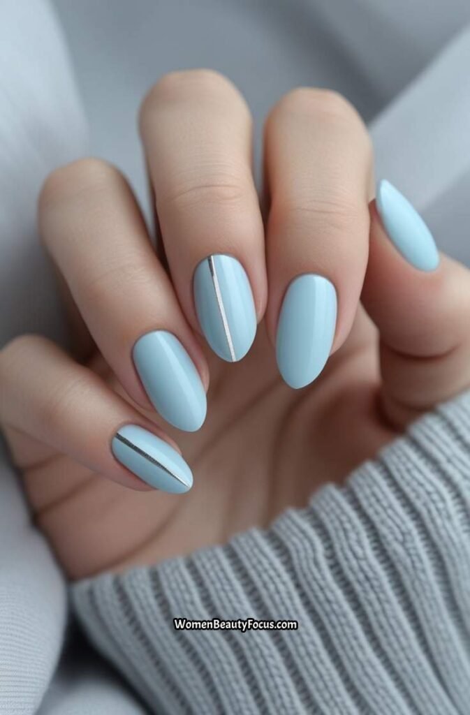 6. Pale Blue Nails with Minimalist Design