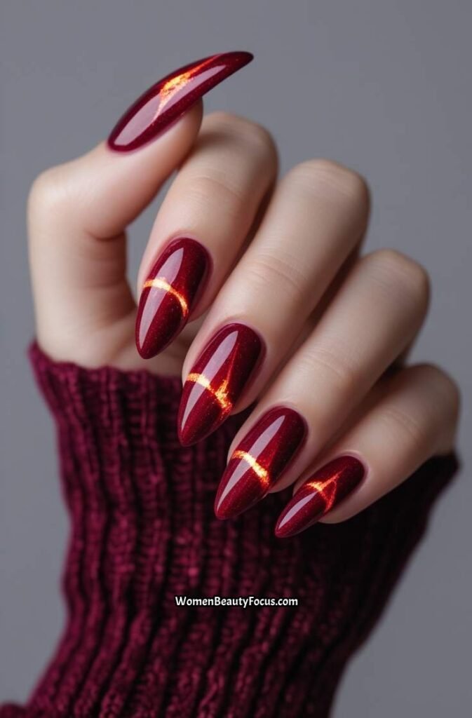 6. Ruby Red Cat Eye Nails