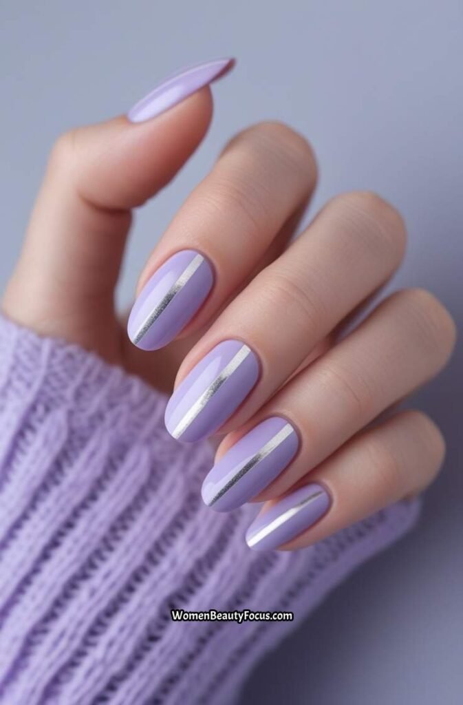 6. Soft Lavender Nails with Silver Stripes