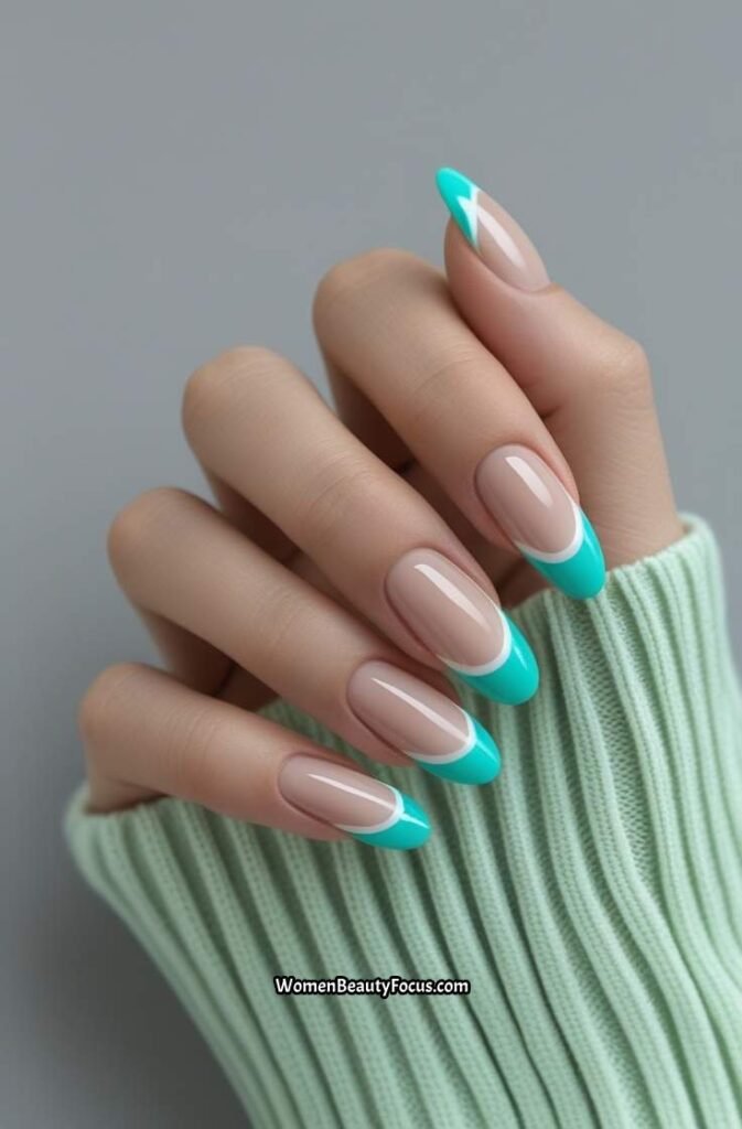 6. Turquoise French Tips on Neutral Base