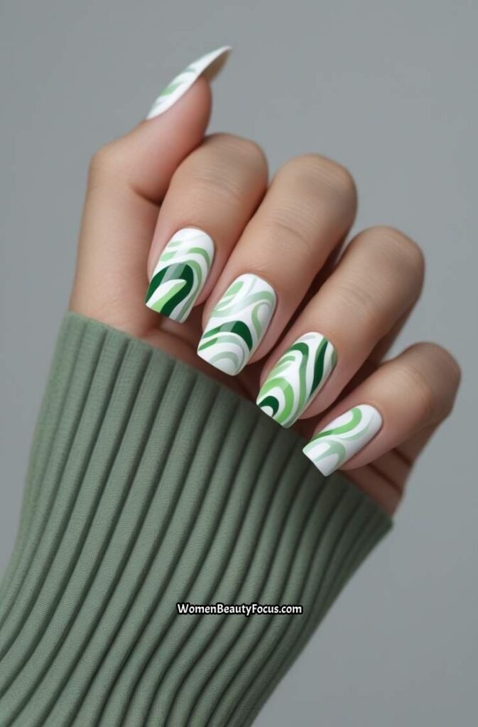 7. Abstract Green and White Nails