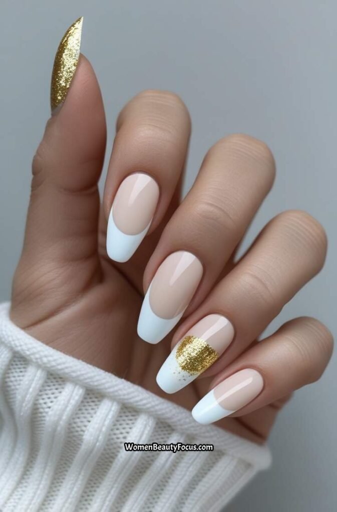 7. Classic White French Tips with a Gold Touch