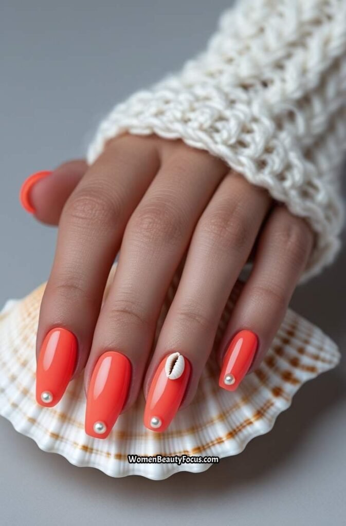 7. Coral Reef Nail Art with Shell Details