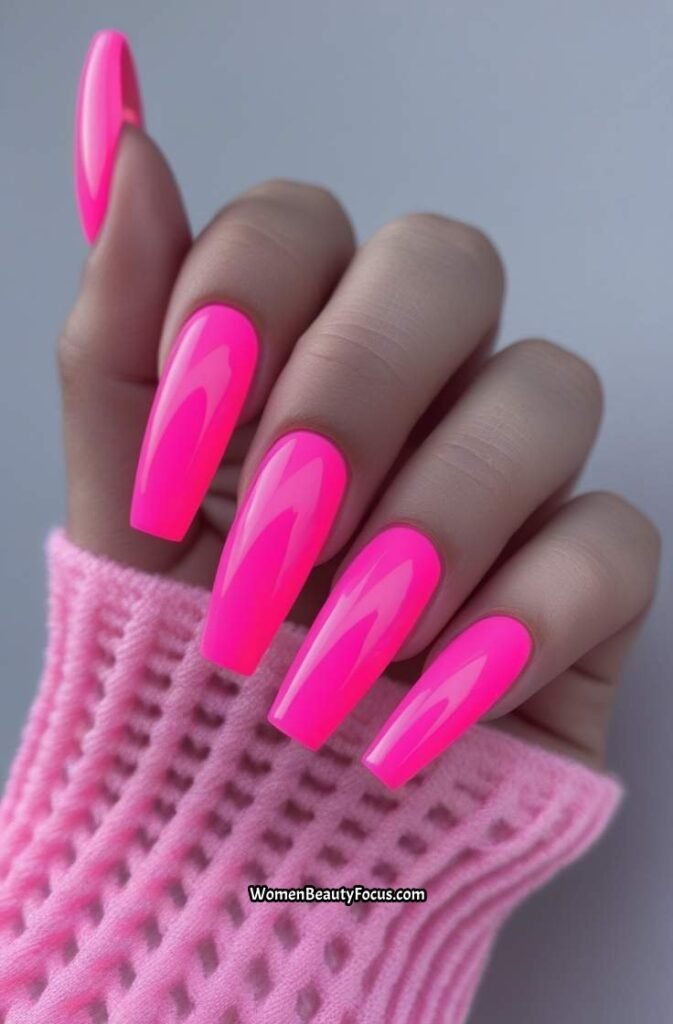 7. Neon Pink Coffin Nails with Glossy Finish