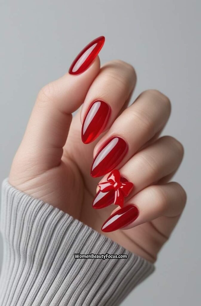 7. Red Glass Nails with 3D Bow Charms
