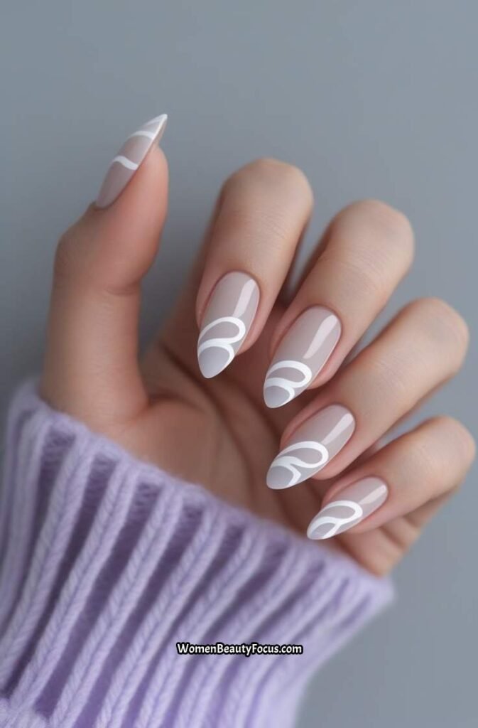 7. White Swirl Accent Nails